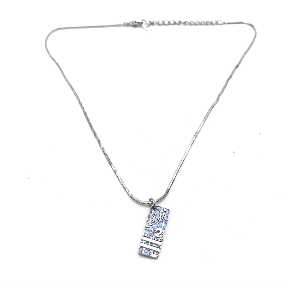 Christian dior blue trotter pendant necklace