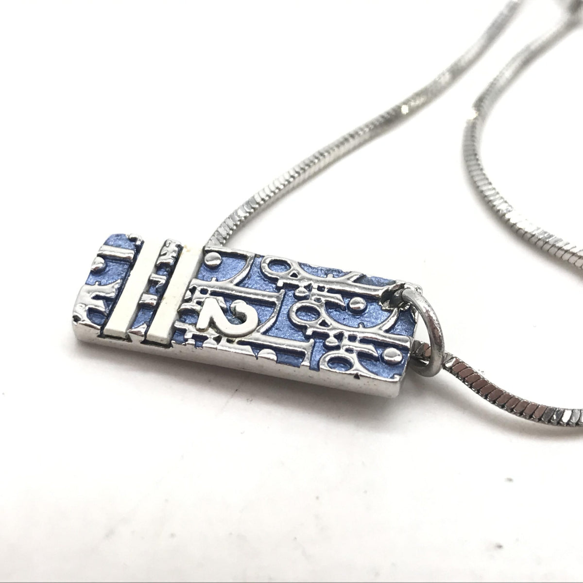 Christian dior blue trotter pendant necklace