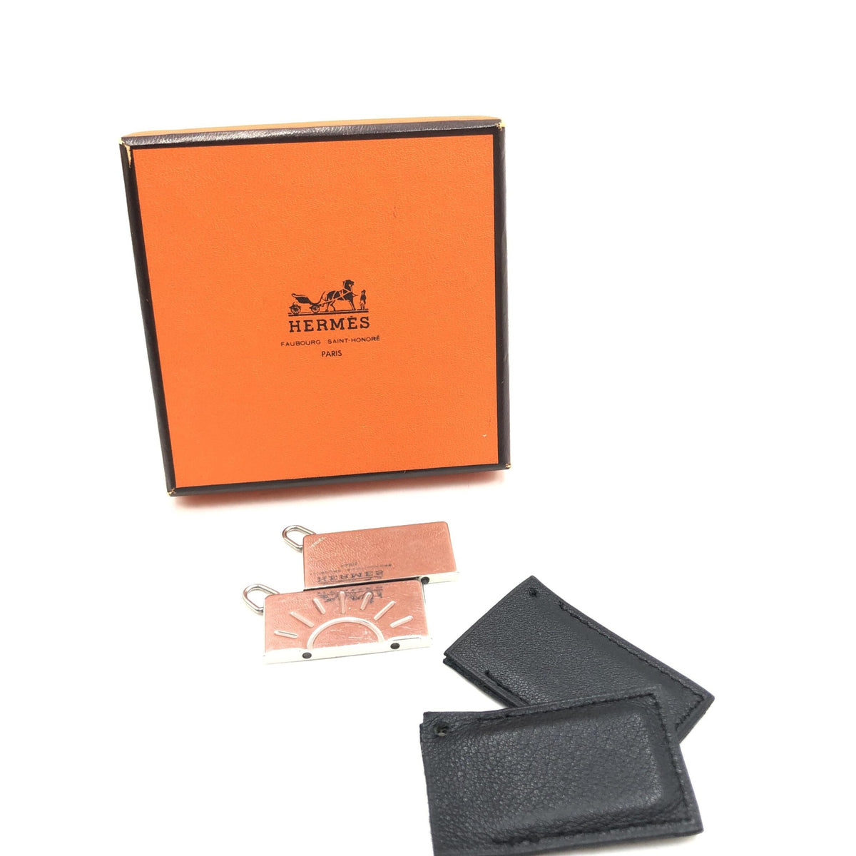 Hermès silver tone half sun pendant set